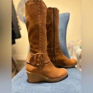 Suede boots with wedge heel.